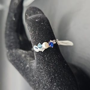J-7 Silvertone ring with small pearl and multicolored stones